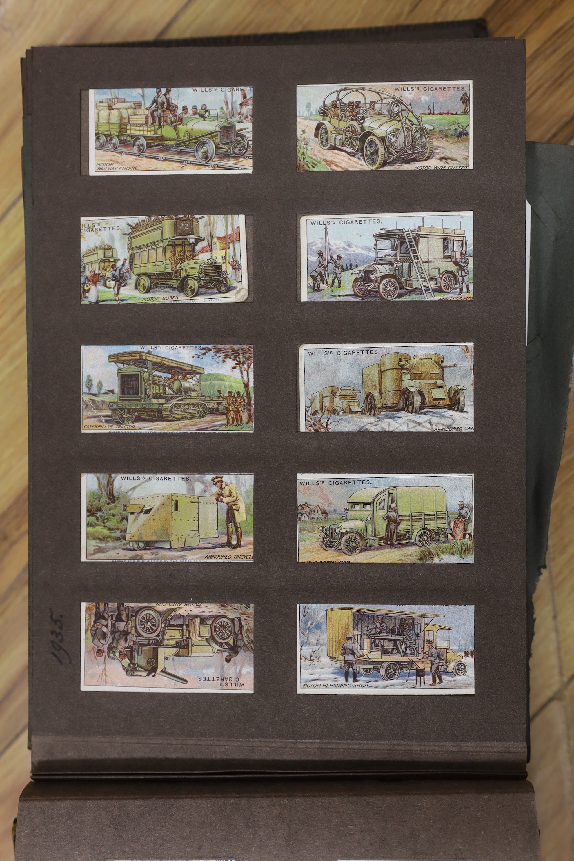 A collection of cigarette cards in albums
